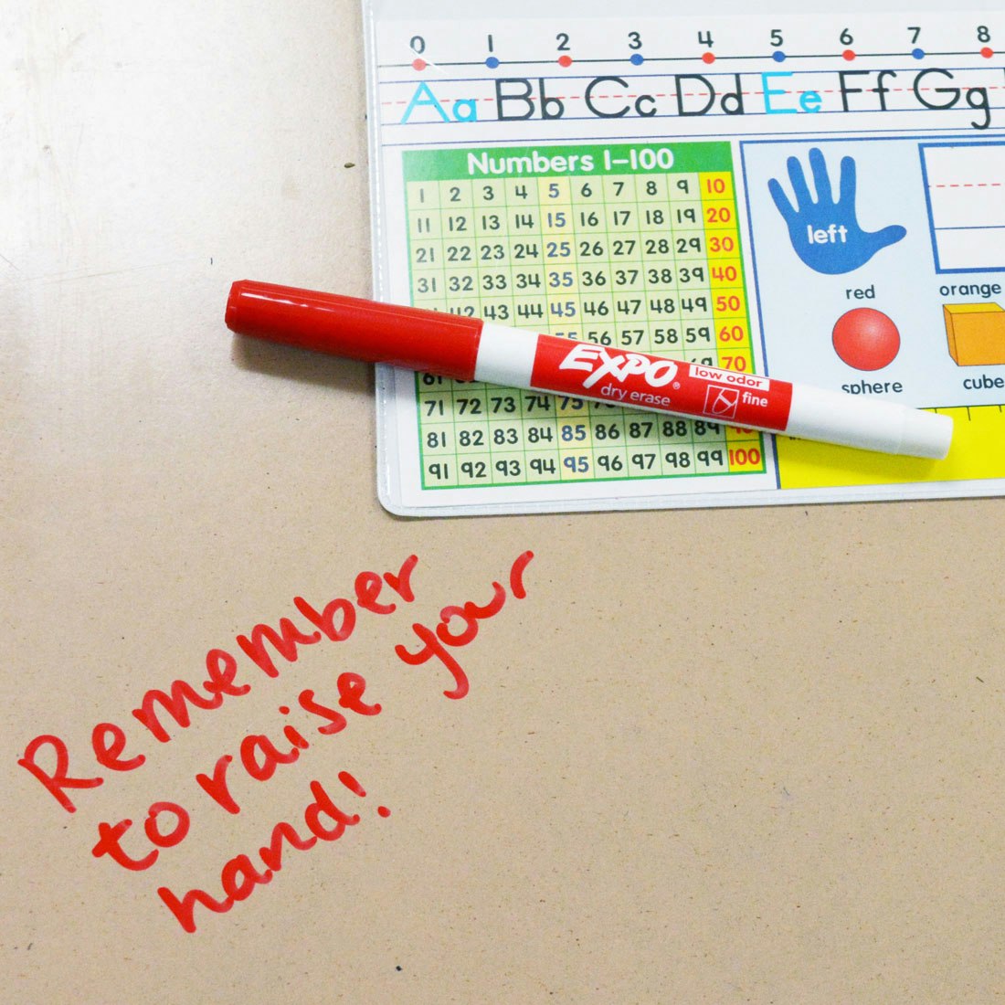 reminder-written-on-desk-from-teacher-in-red-fine-expo.jpg